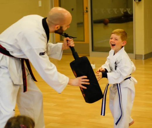 Little Ninjas Taekwondo class striking foam pad