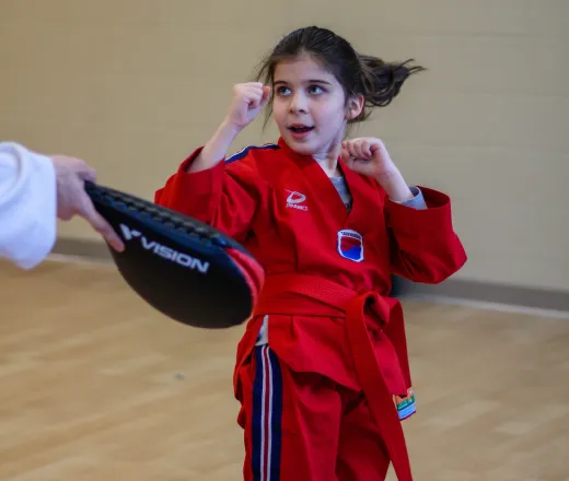 Beginning Taekwondo student preparing for a kick