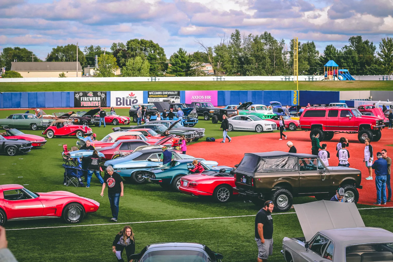 Classic cars on a baseball diamond