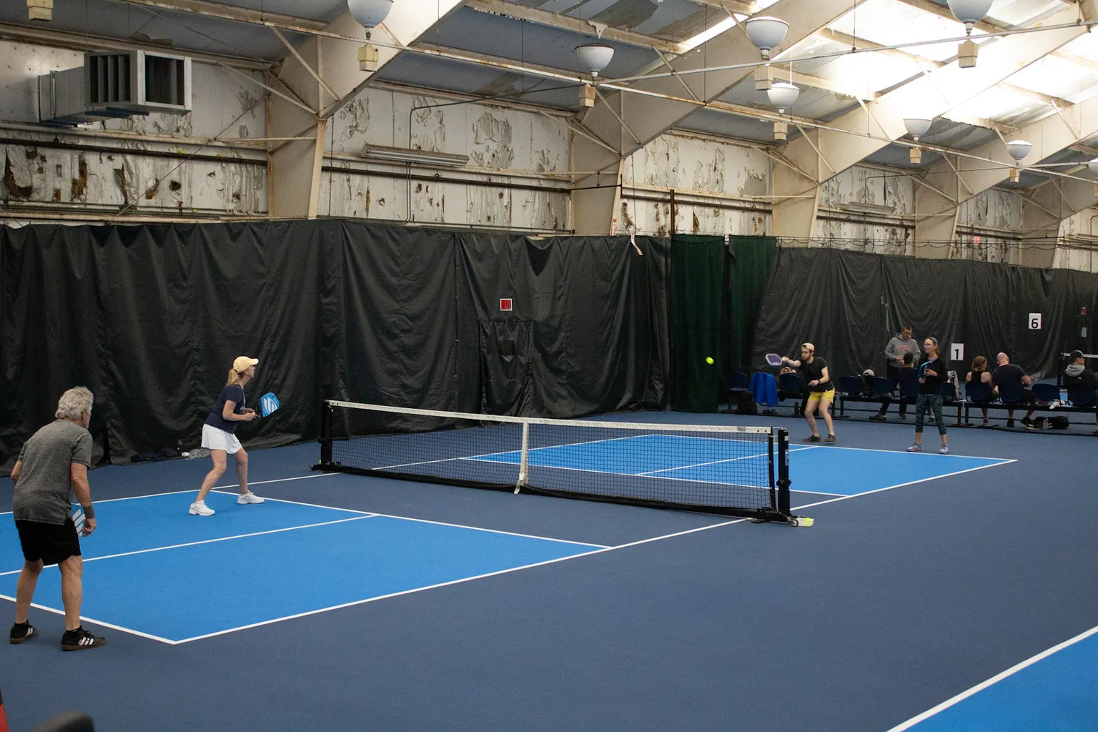 Pickleball game on the indoor court